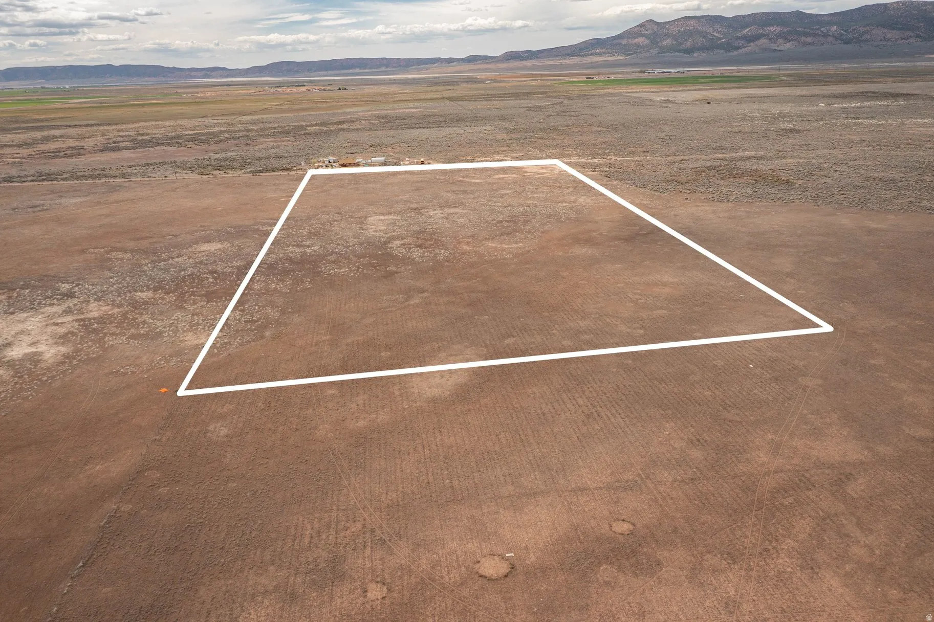 View of rural area featuring mountains and property parcel outlined