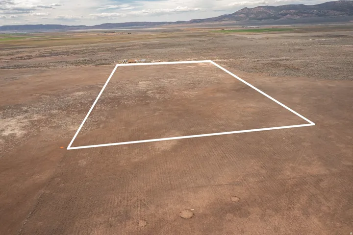View of rural area featuring mountains and property parcel outlined