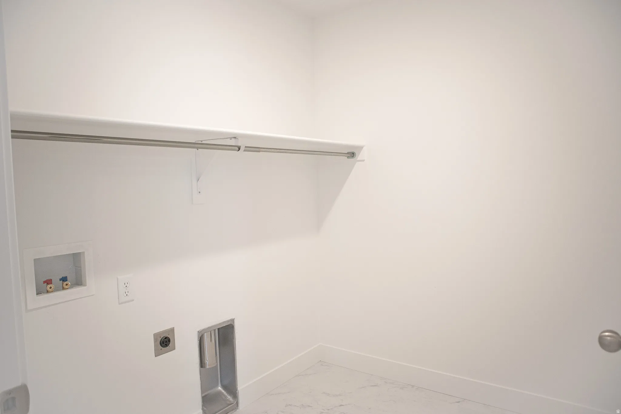 Full-size laundry room with washer/dryer hookups.