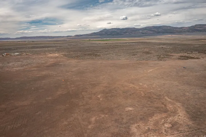 View of mountain background with rural landscape and a desert landscape