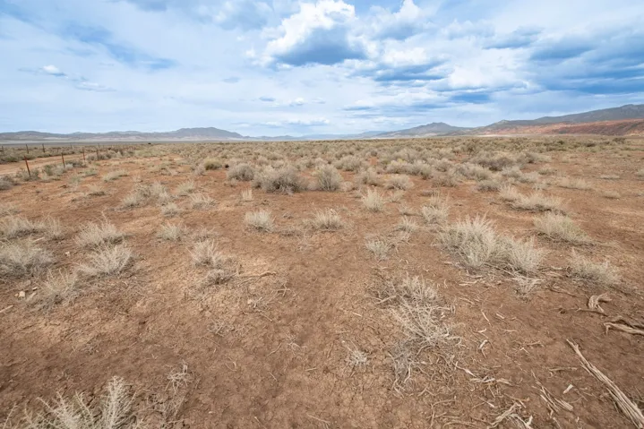 View of mountain backdrop with a desert landscape