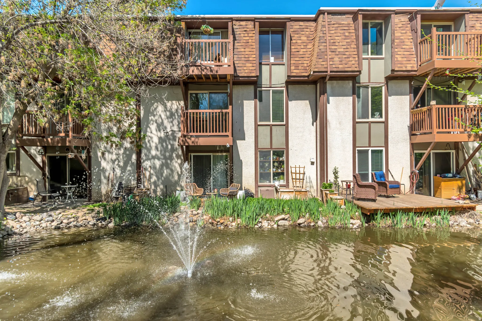 View of apartment building / complex with a water view