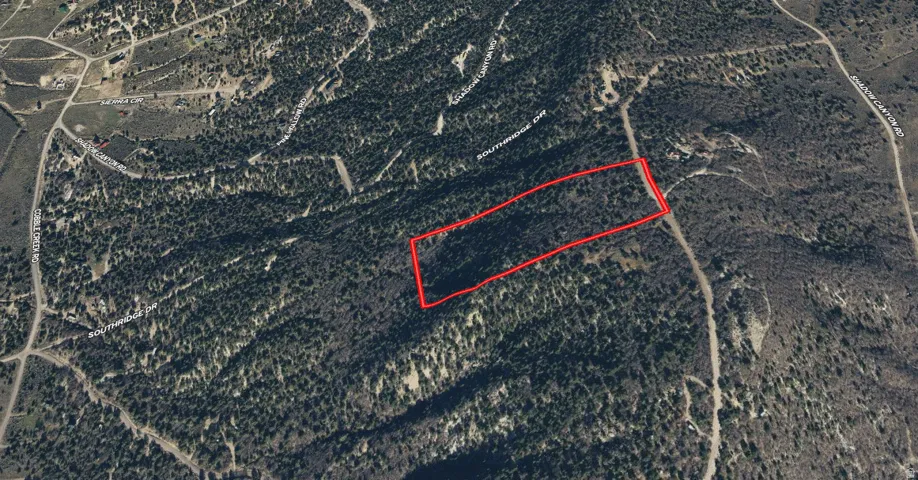 Aerial view of property's location with property parcel outlined
