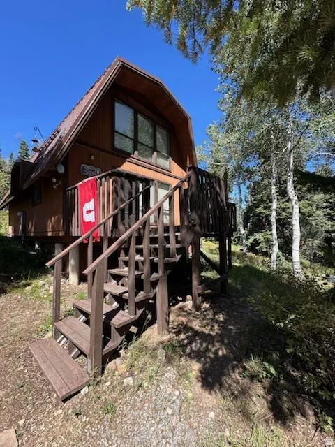 View of home's exterior featuring stairway