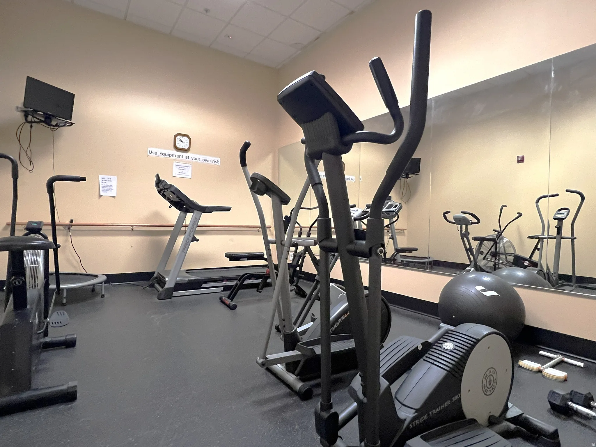 Recreation Room Gym featuring a paneled ceiling
