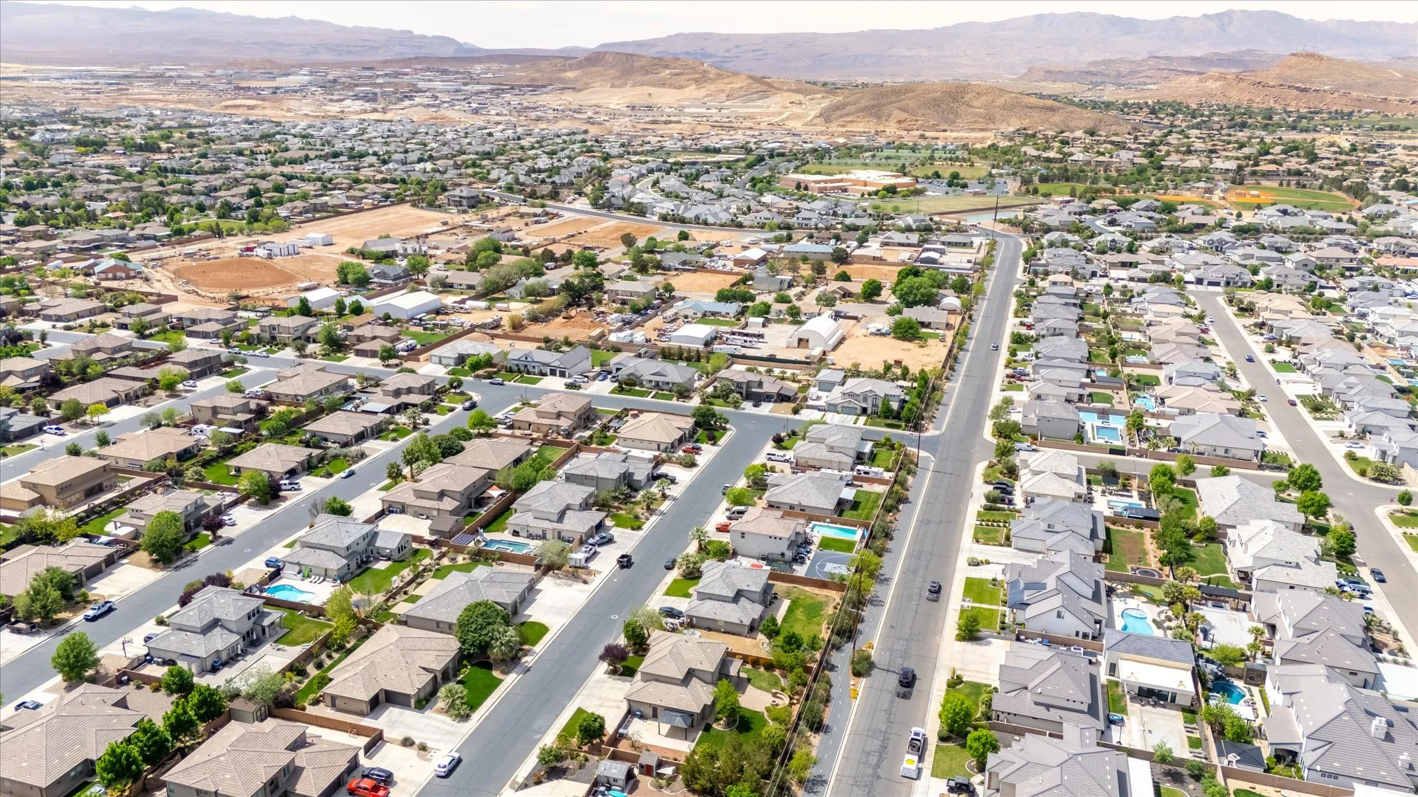 Aerial perspective of suburban area with mountains