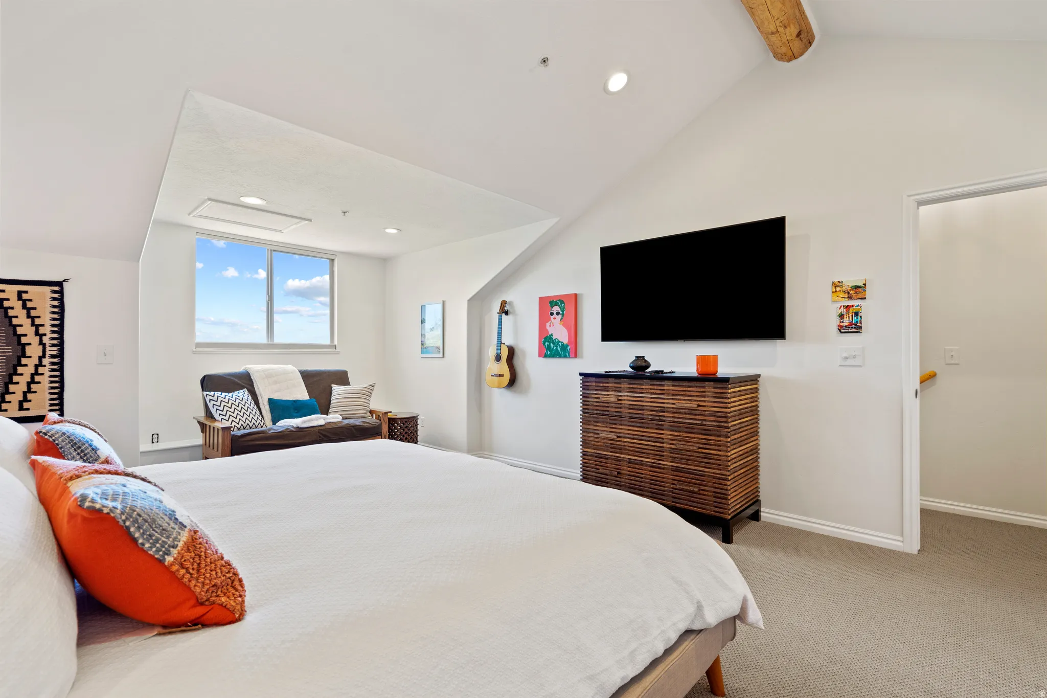 Bedroom featuring light carpet, recessed lighting, and beam ceiling