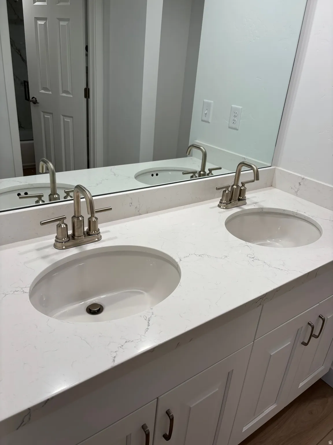 Bathroom featuring double vanity