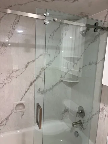 Full bath with enclosed tub / shower combo