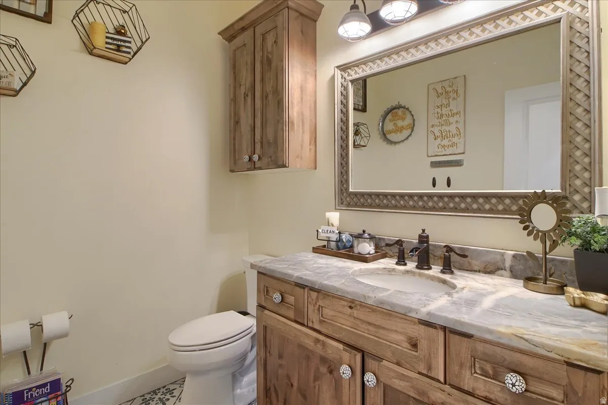 Bathroom with vanity and toilet