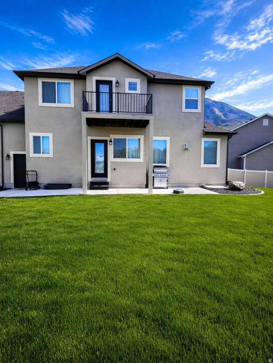 Expansive green lawn providing a substantial outdoor recreation area