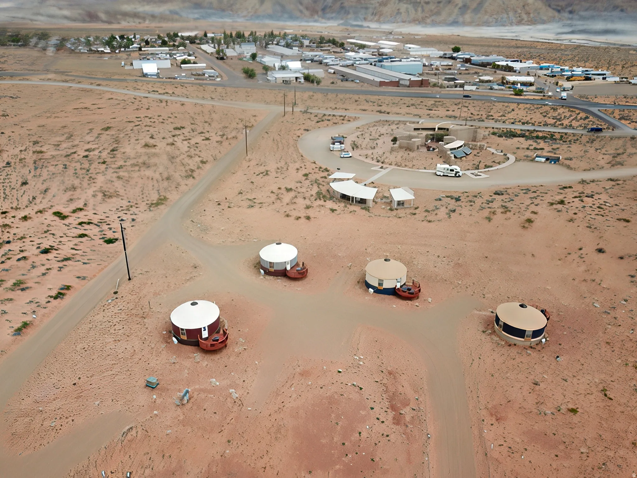 Aerial overview of property's location featuring a desert landscape