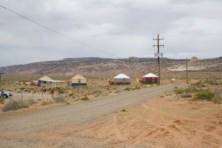 View of mountain backdrop with rural landscape