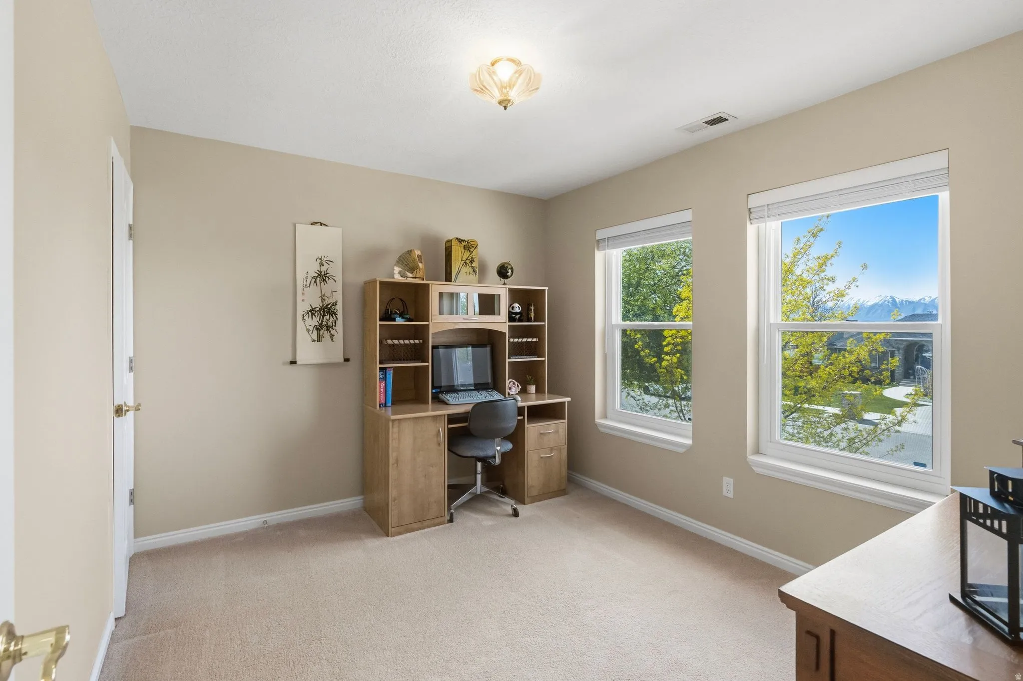 2nd level bedroom staged as an office.