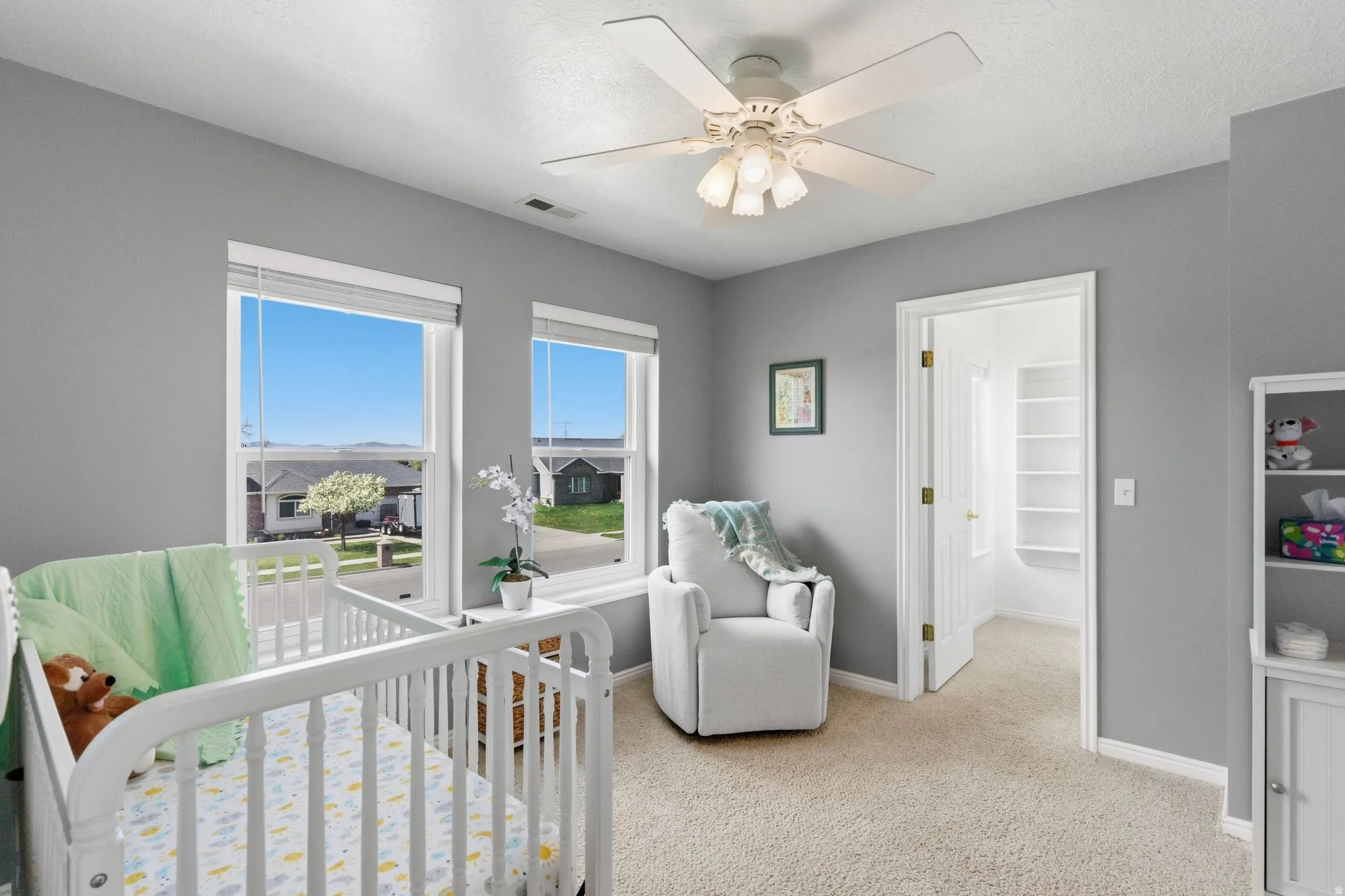 2nd level bedroom staged as a nursery.