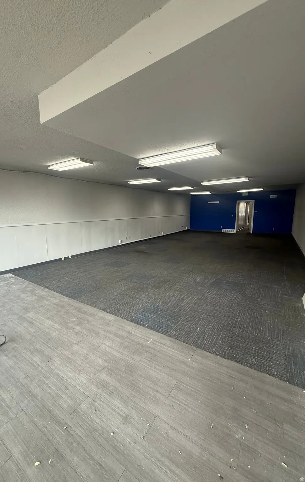Miscellaneous room featuring a textured ceiling