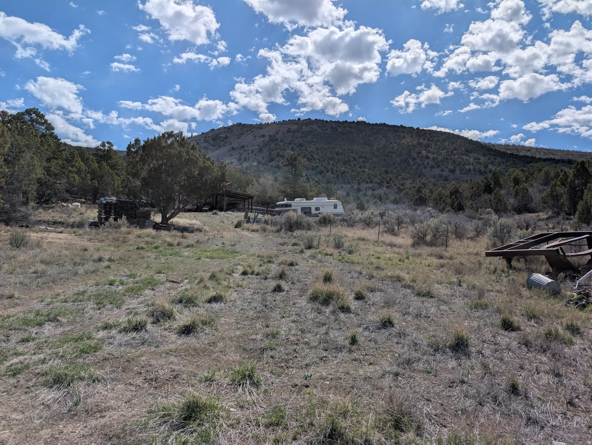 View of mountain background featuring rural landscape