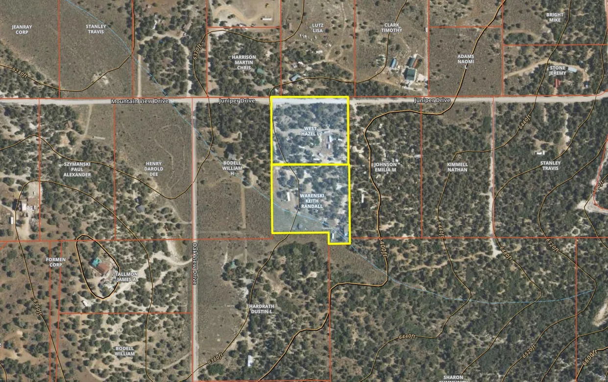 Aerial view of property's location with property parcel outlined