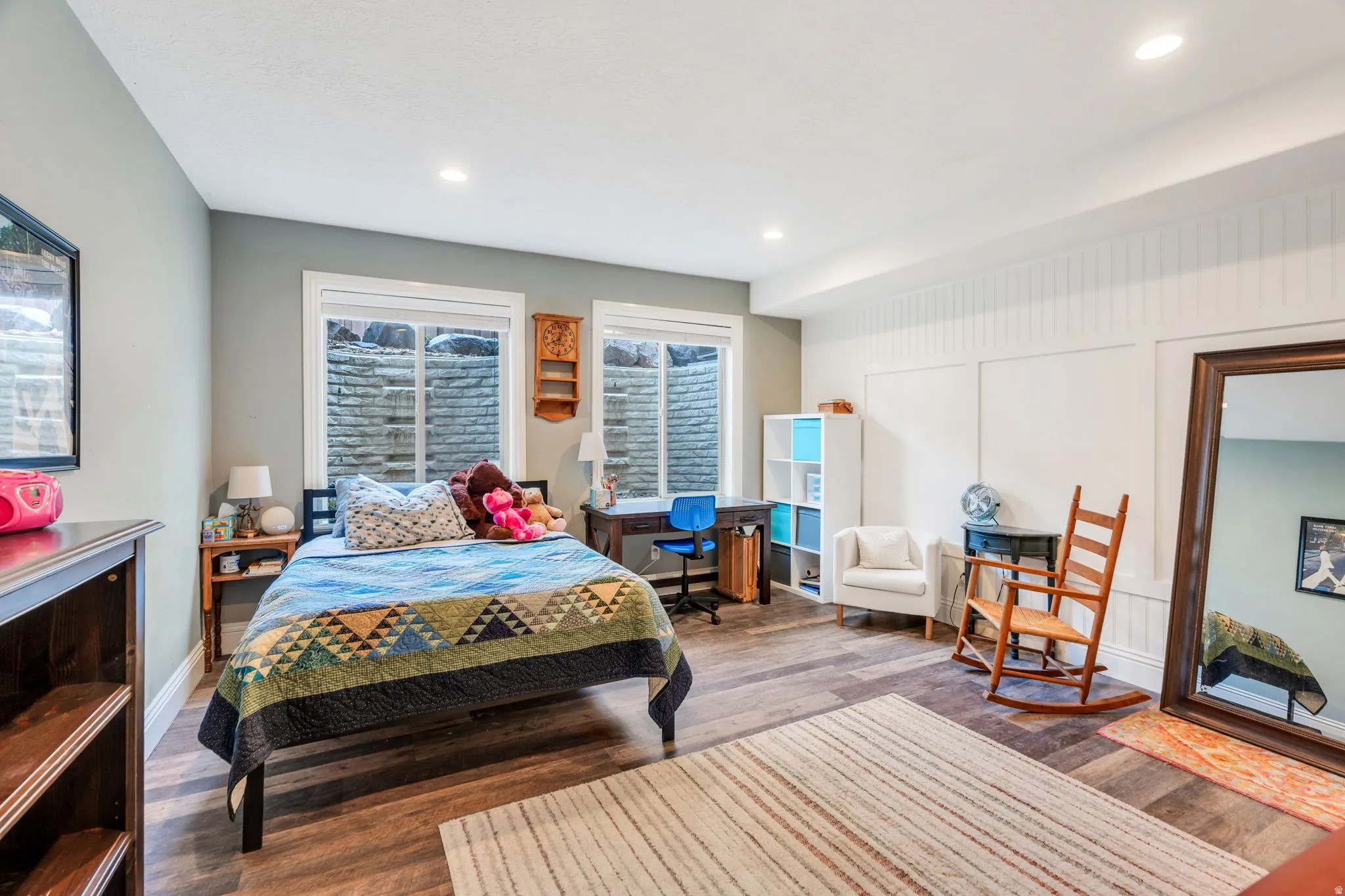 Bedroom with wood finished floors and recessed lighting