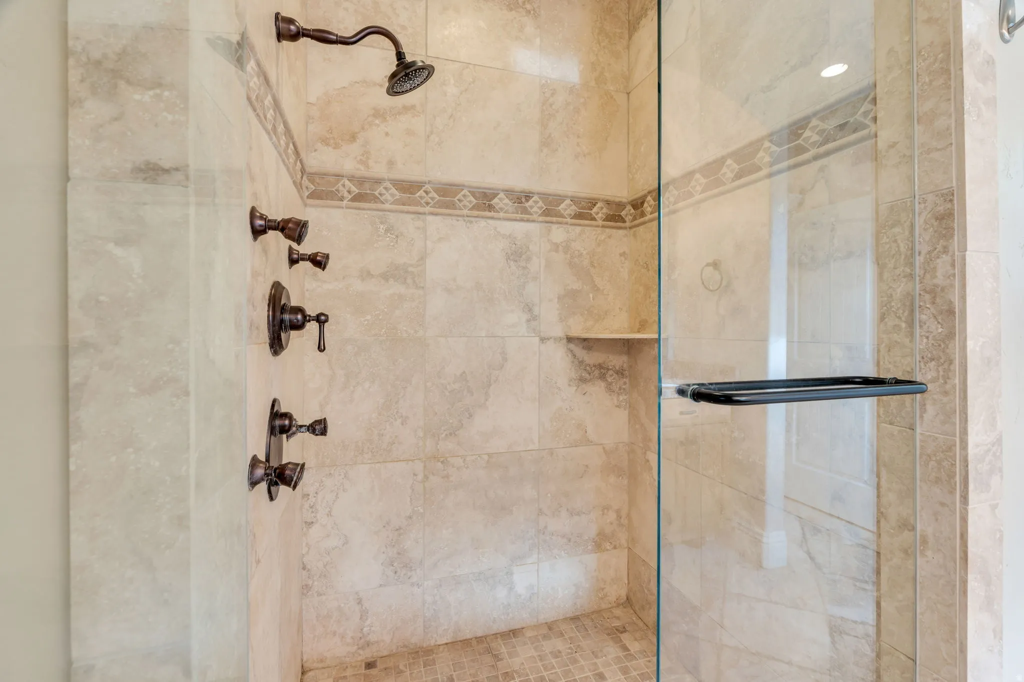 Full bath with a shower stall