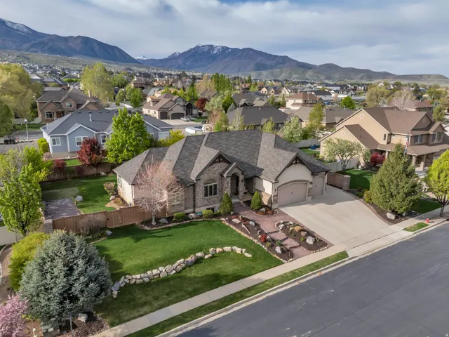 Aerial perspective of suburban area with a mountain backdrop