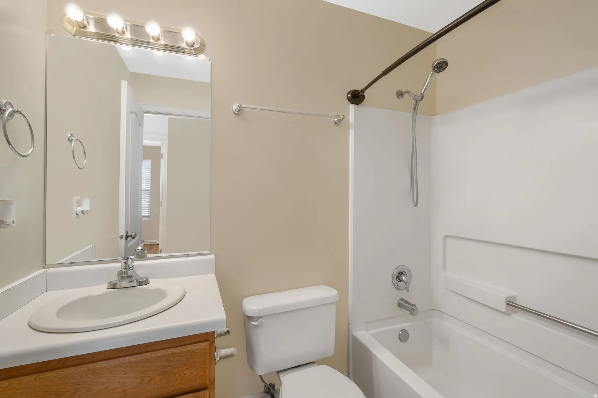 Full bathroom with vanity and bathing tub / shower combination