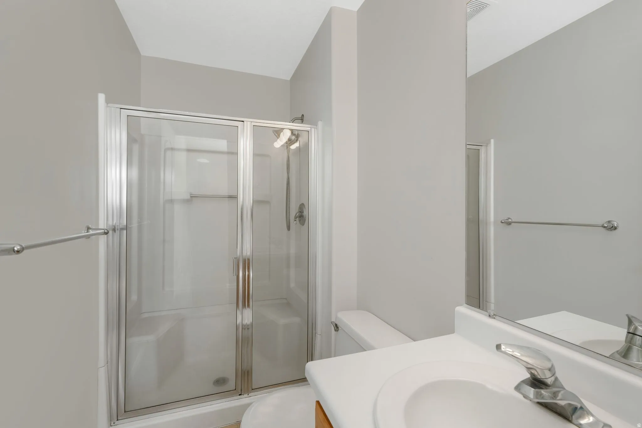 Primary Full bathroom featuring vanity and a stall shower