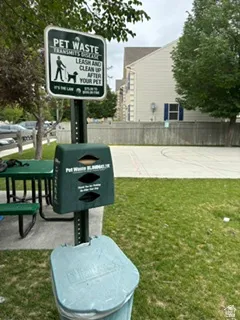 Pet waste station with dispenser and refuse bin