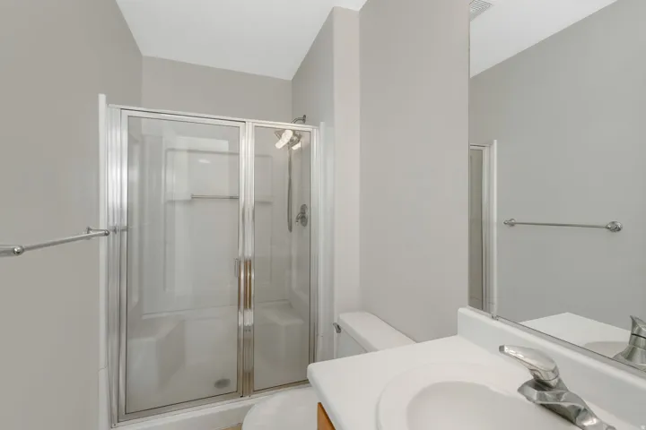 Primary Full bathroom featuring vanity and a stall shower