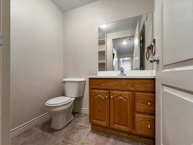 Bathroom featuring vanity and light tile patterned floors
