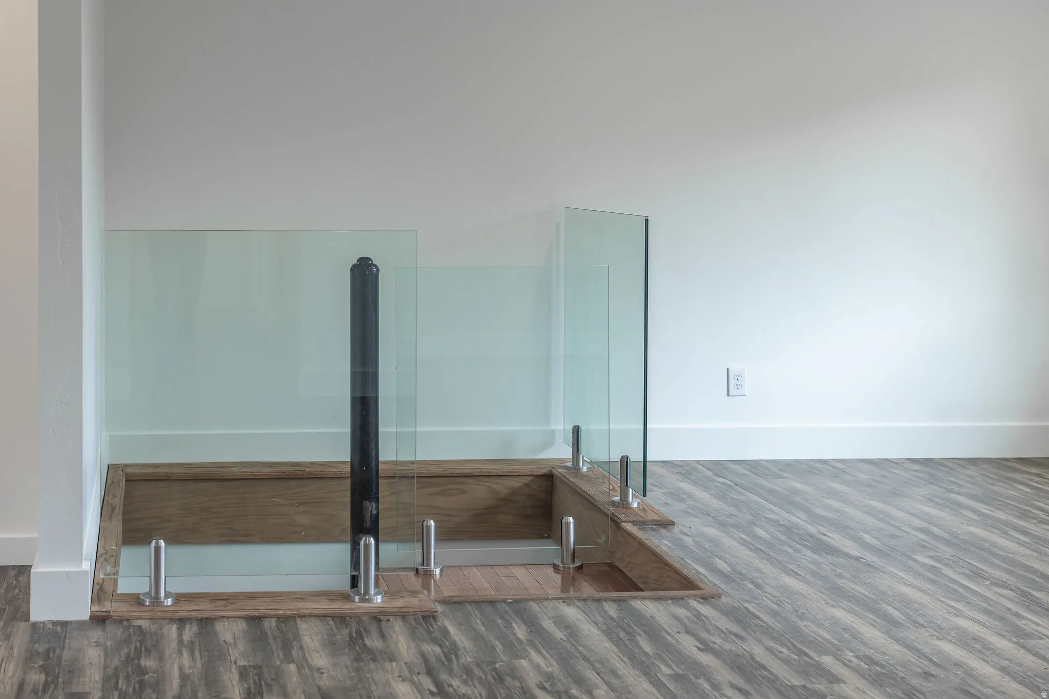 Bathroom with dark wood-style flooring