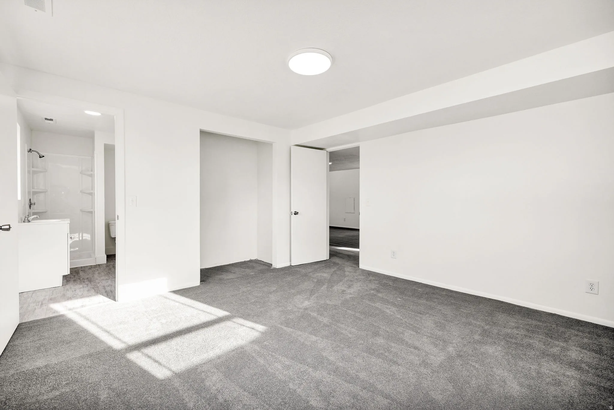 Unfurnished bedroom featuring carpet floors and a closet