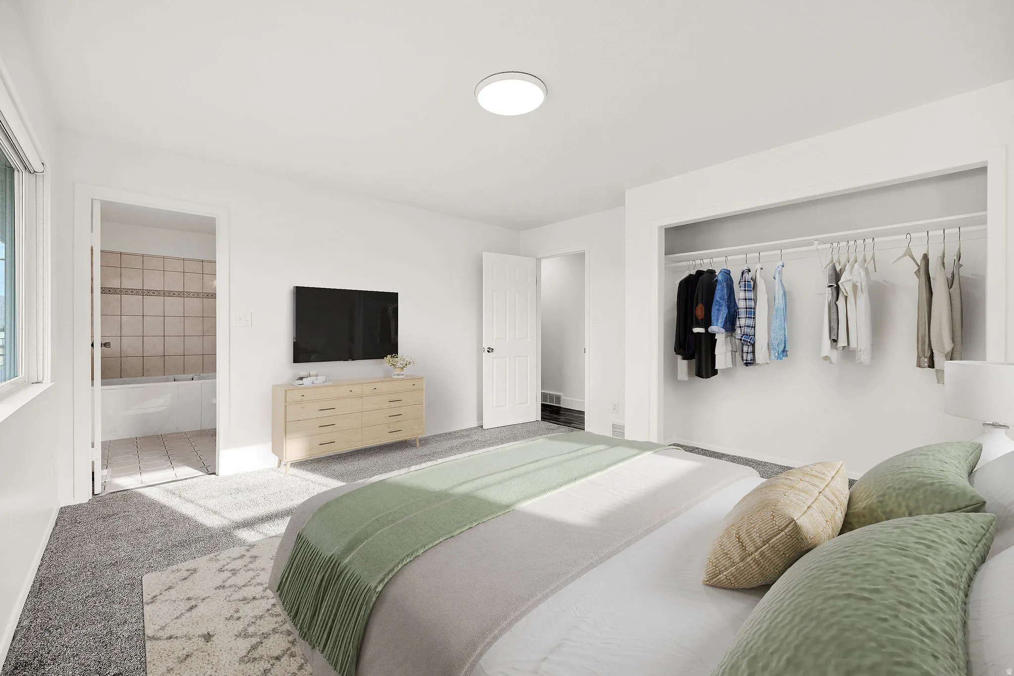 Virtually staged. Bedroom featuring plush gray carpeting, a built-in open closet system, and a flush-mount ceiling light fixture