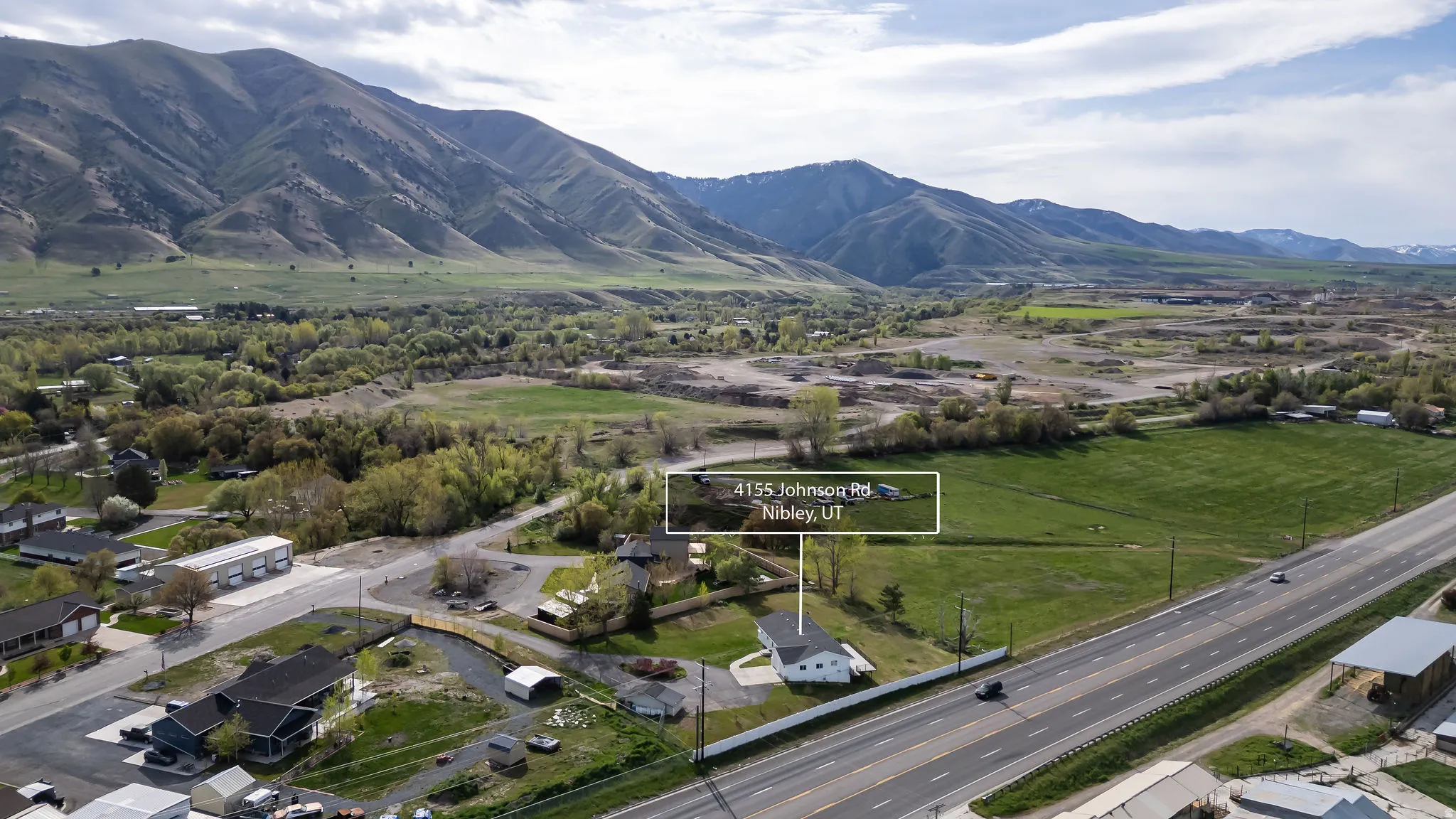 View of mountain background featuring nearby suburban area
