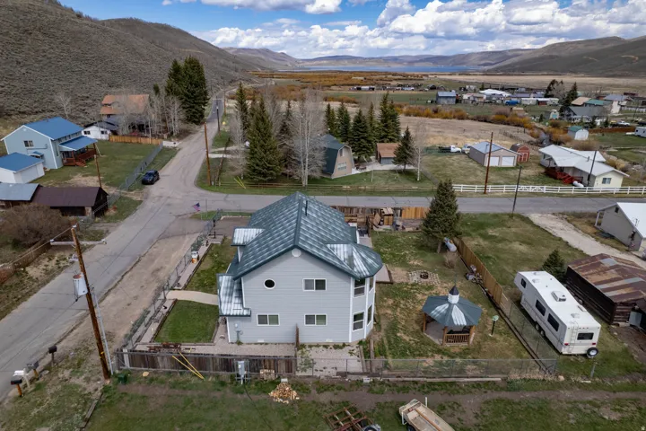 Aerial view of residential area featuring mountains