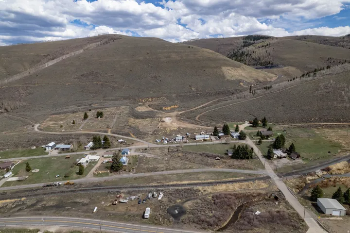 Aerial view of sparsely populated area with mountains