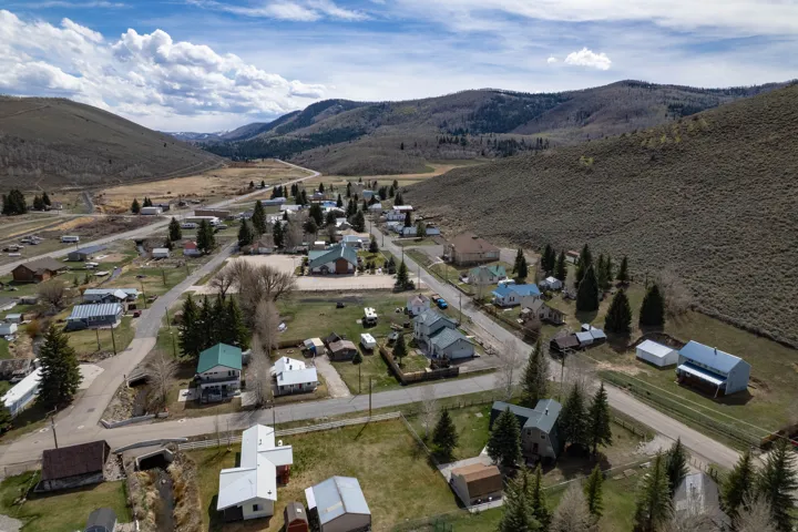 View of Scofield town featuring a mountainous background and nearby suburban area
