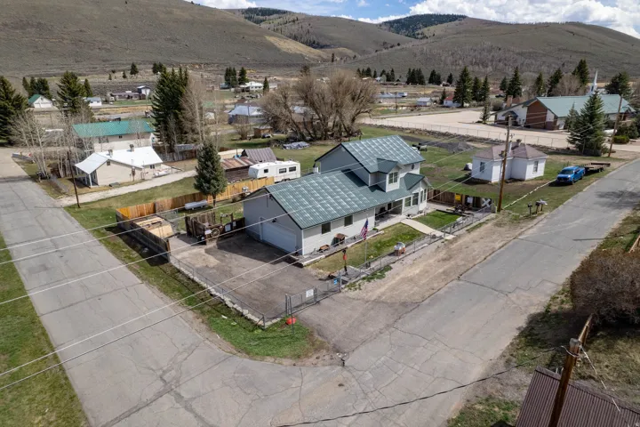 Aerial view of residential area with a mountainous background