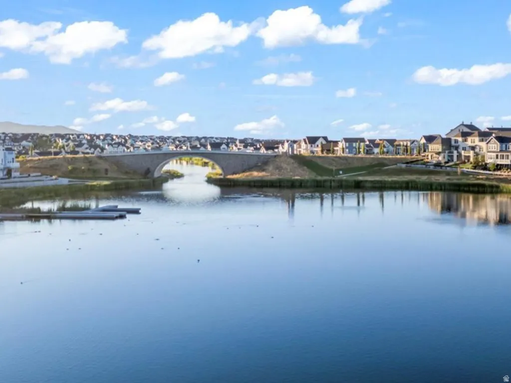 Water view featuring nearby suburban area