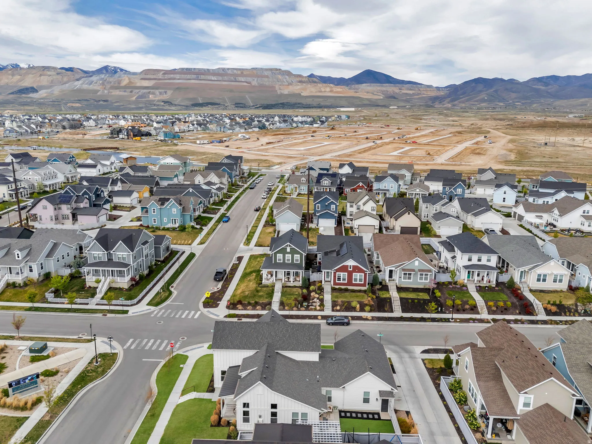 Aerial perspective of suburban area featuring mountains