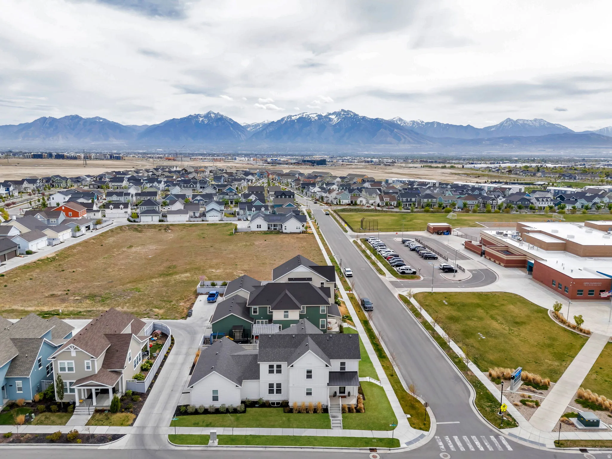 Aerial perspective of suburban area with mountains