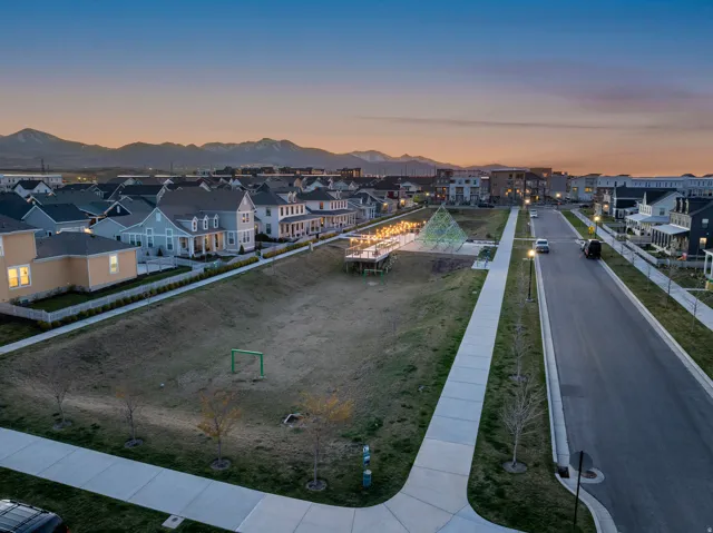 Aerial view at dusk of a residential view and a mountain view