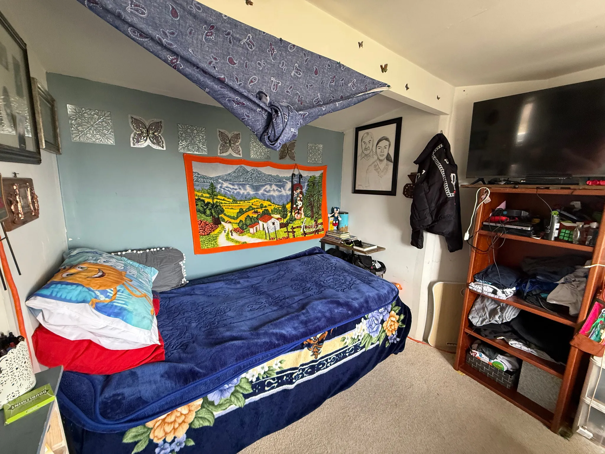 Bedroom with light colored carpet