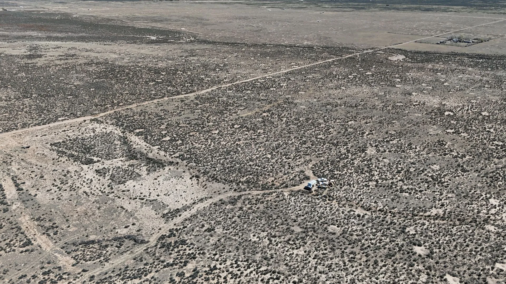 Aerial view of sparsely populated area featuring a desert landscape