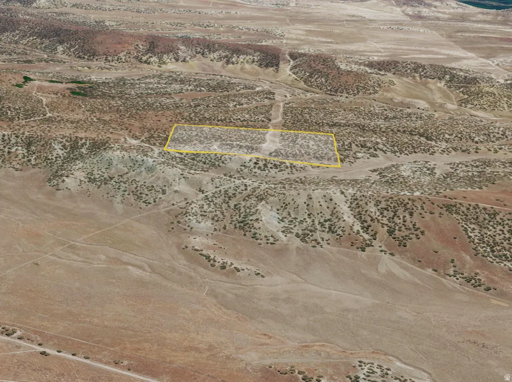 Expansive land parcel featuring desert topography with varied elevations