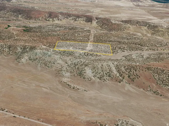 Expansive land parcel featuring desert topography with varied elevations