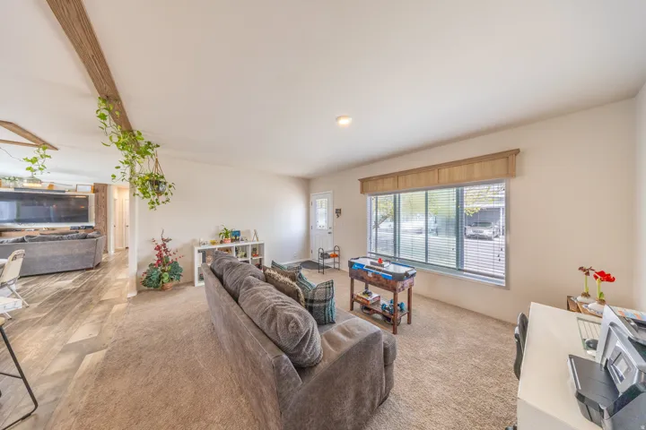 Living room with light colored carpet