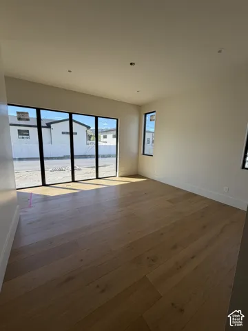 Guest suite featuring private entrance from the main home and its own outside entrance.  Walk-in closet with washer and dryer, wet bar with mini fridge and microwave and custom full bathroom