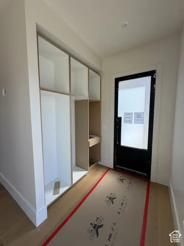 Guest suite entrance with built in cabinetry