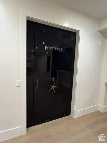 Integrated security vault with a black finish and chrome-toned hardware